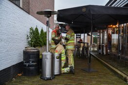 Brandje op terras wijnbar