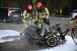 Scooter in brand Loosdrechtse bos